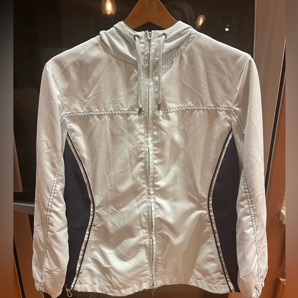 Very pale blue/green and navy lined windbreaker.
